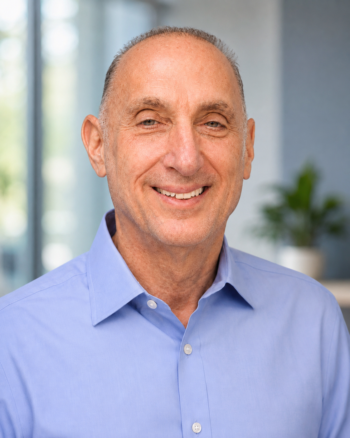 Jay Winestein, President and Senior Planner at National Planning Associates, in a professional office setting.